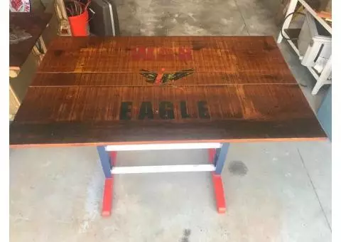 Re-purposed table with war eagle logo on it